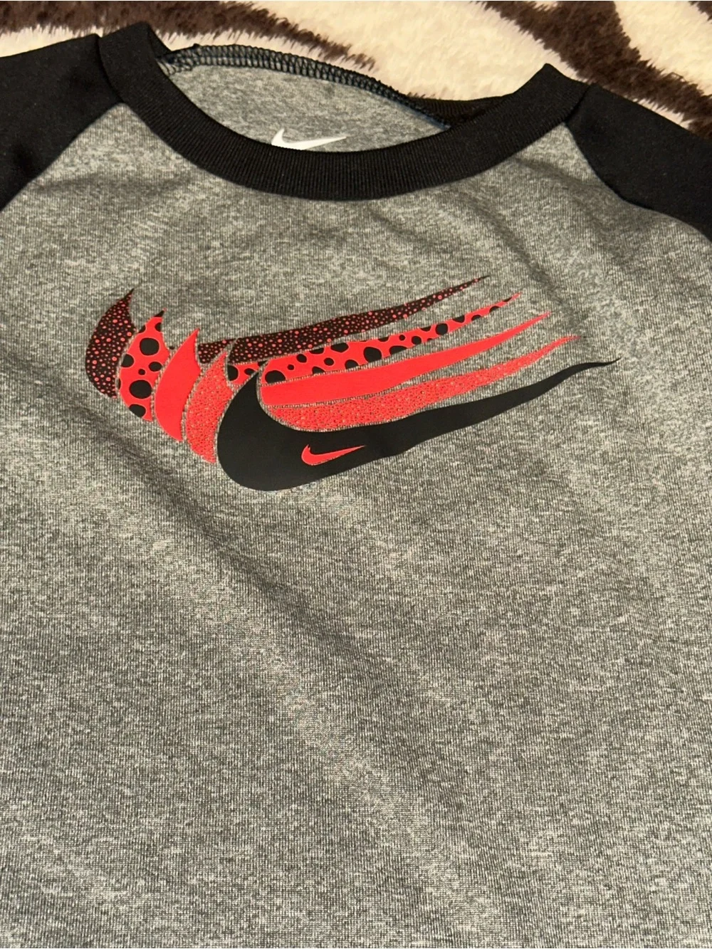 Toddler Nike Gray & Black Long Sleeve Dri-FIT Top with Red Swoosh Graphic